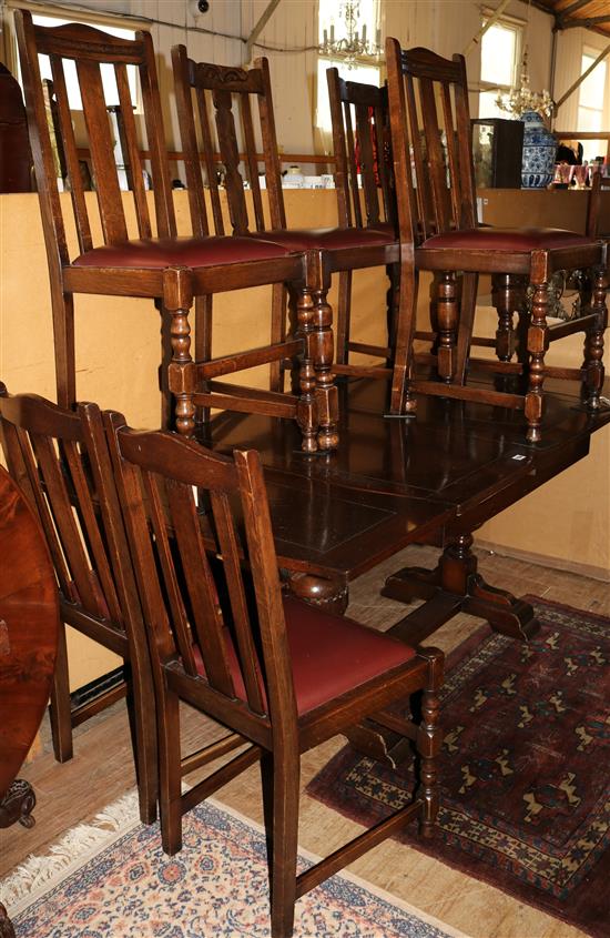 An oak draw leaf dining table and six chairs